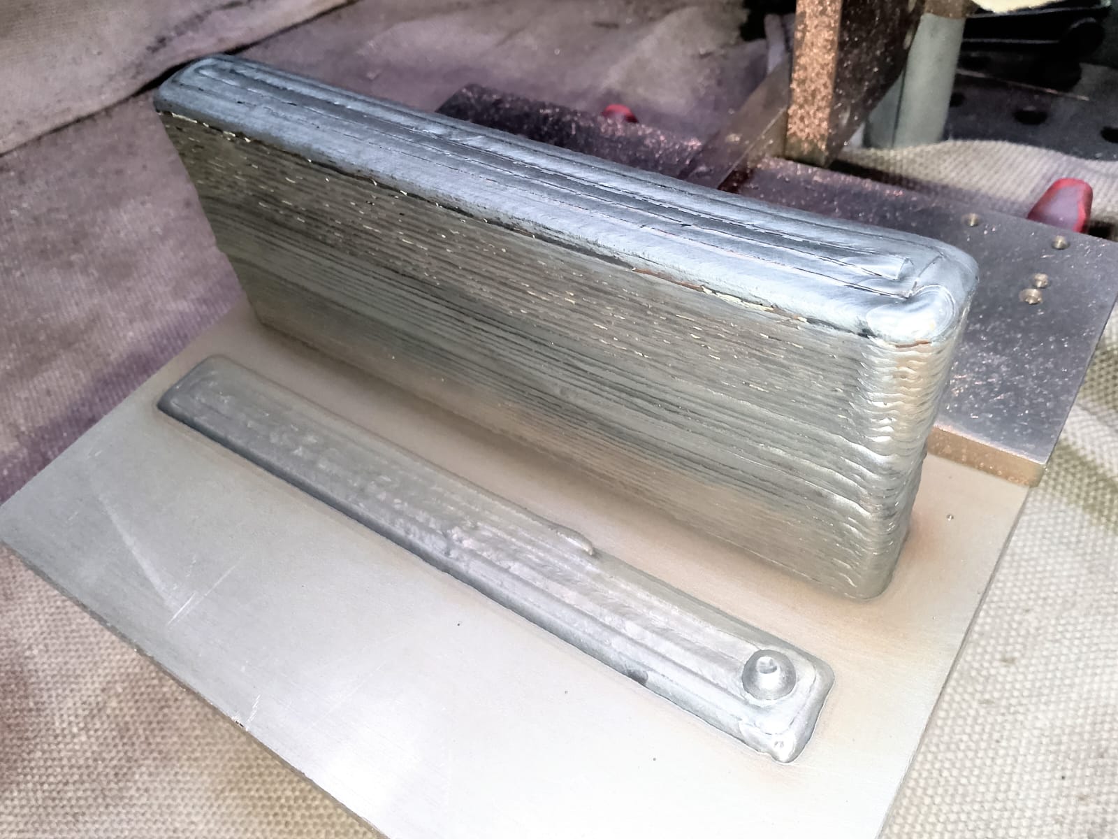 Multi-layer deposited wall produced on DOOSAN WAAM cell